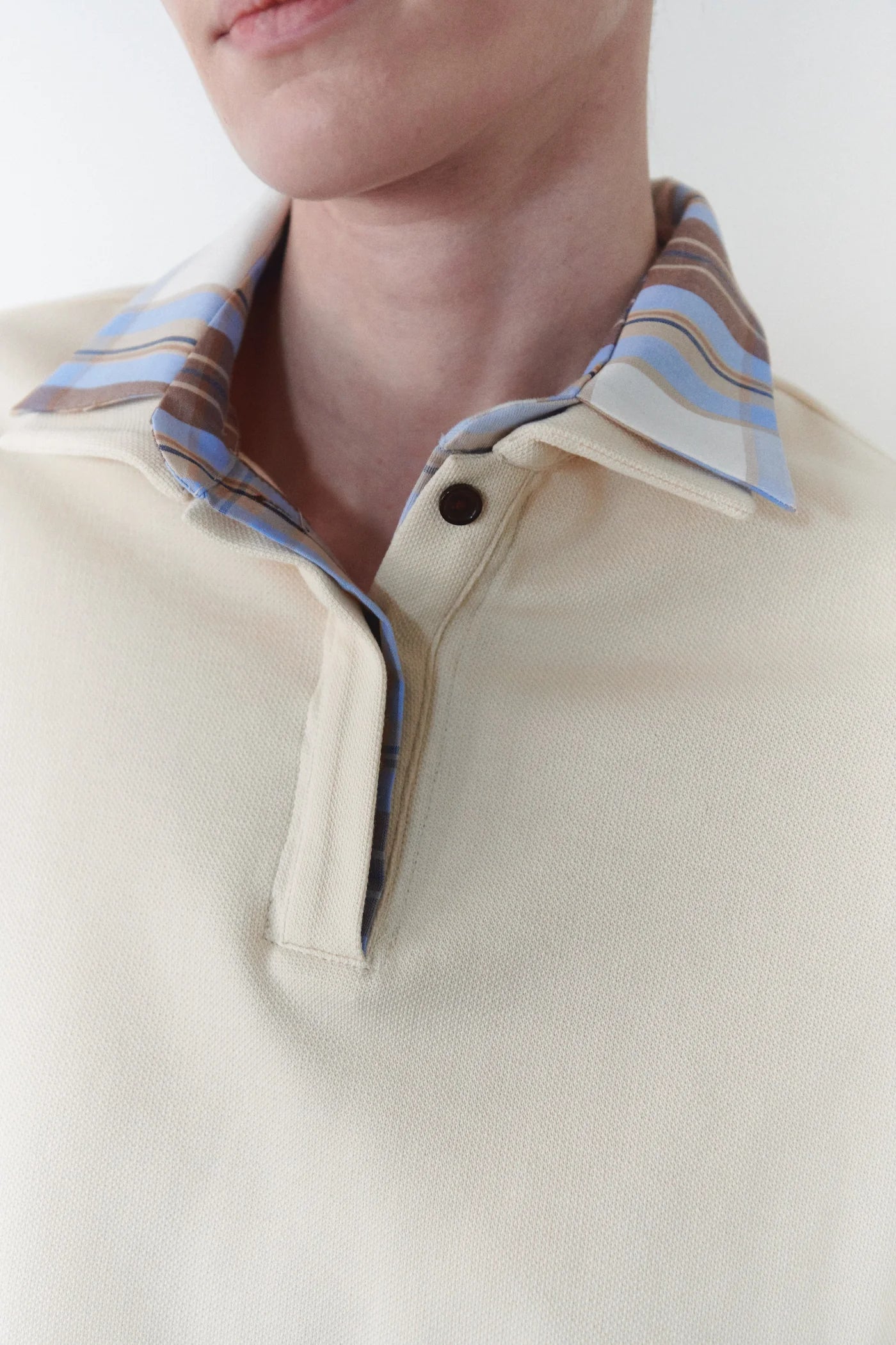 Padded Polo Shirt with Blue Plaid Collar and Cuff Details in Beige