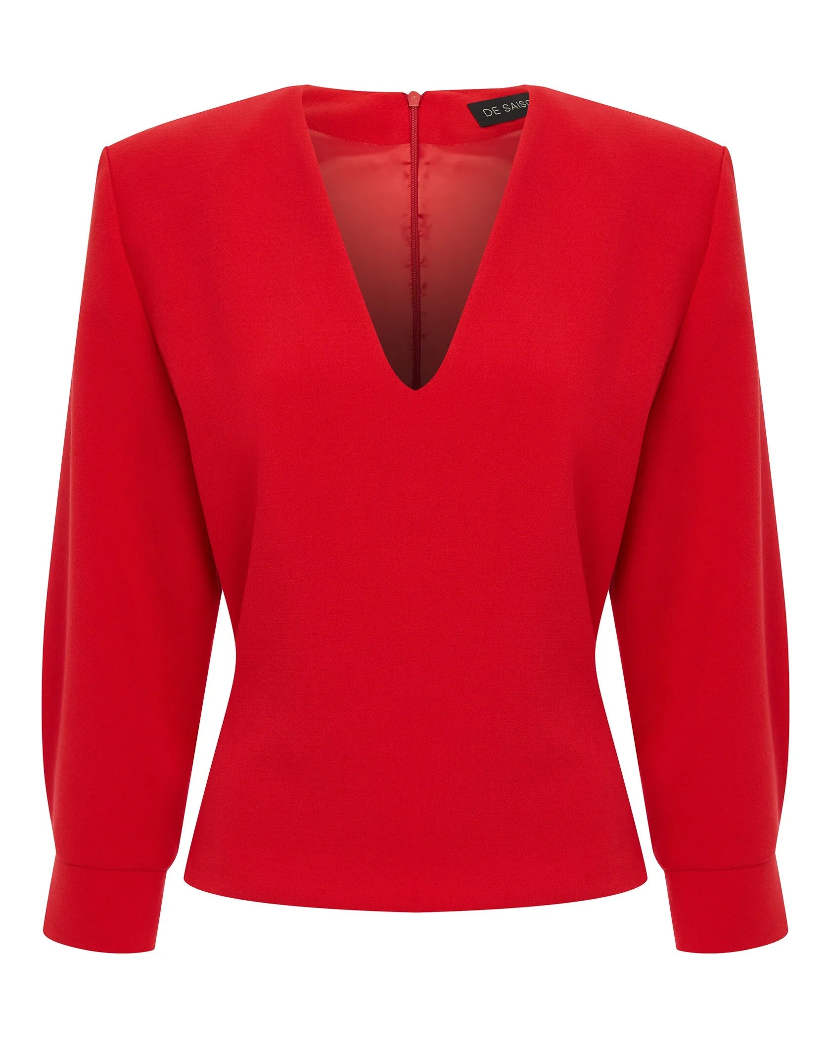 Haut rouge à col en V et épaules bouffantes