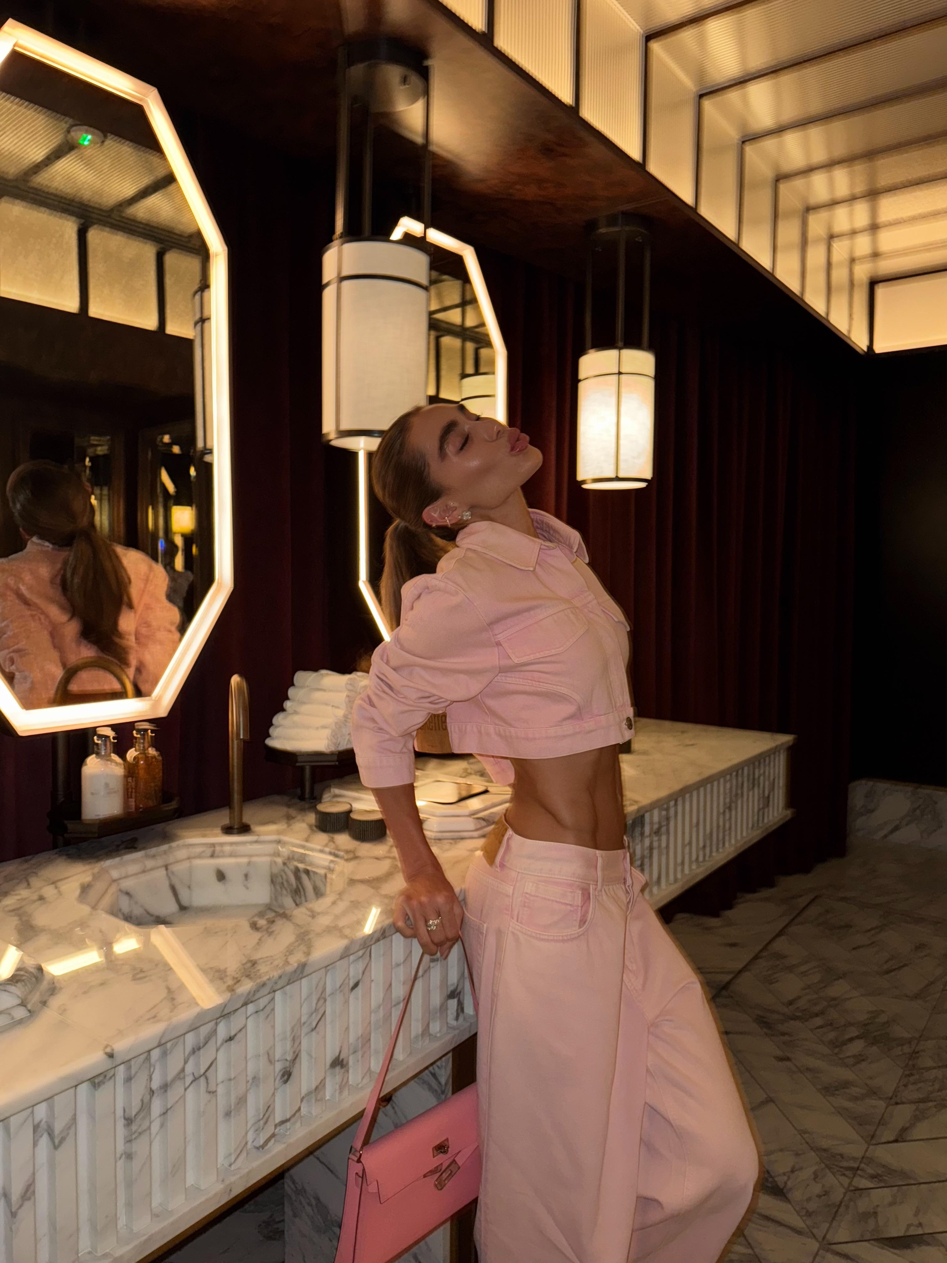 Pantalon taille basse à jambes larges rose pâle